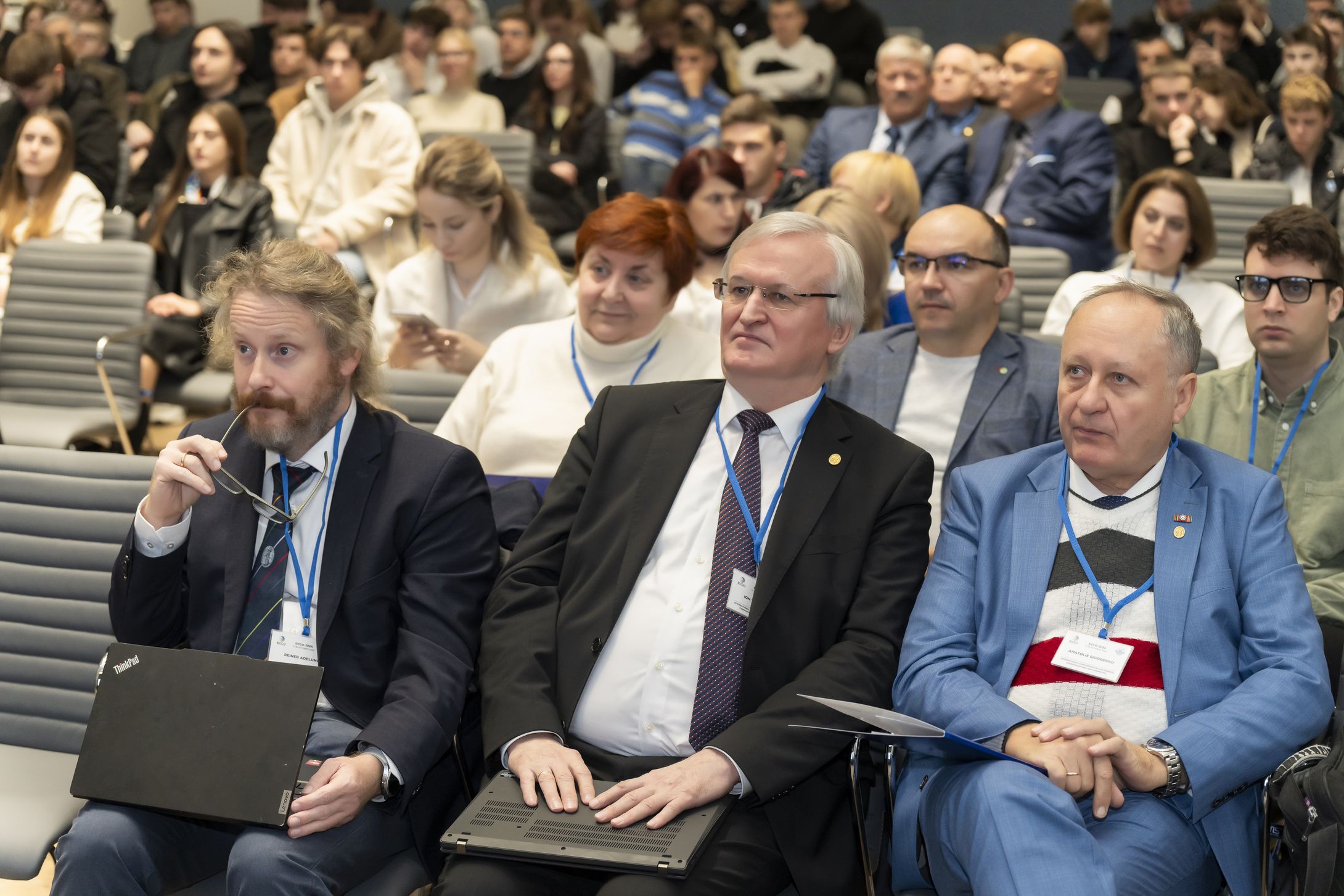 With the Organizing Committee